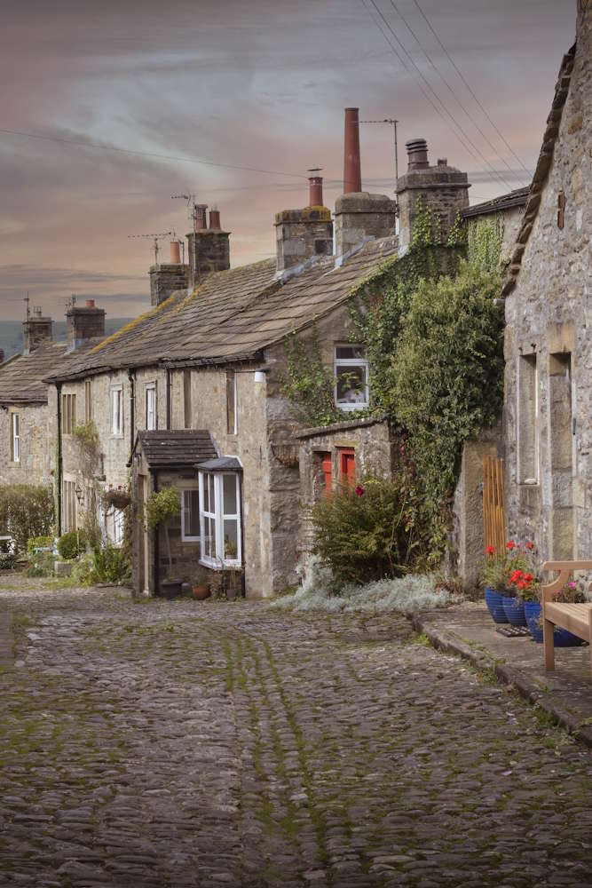 A residential cobbled village street in Yorkshire